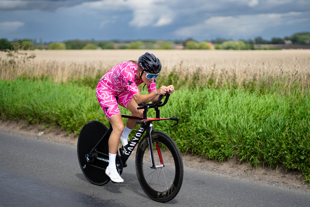 Woman running wearing the sleeveless womens tri suit